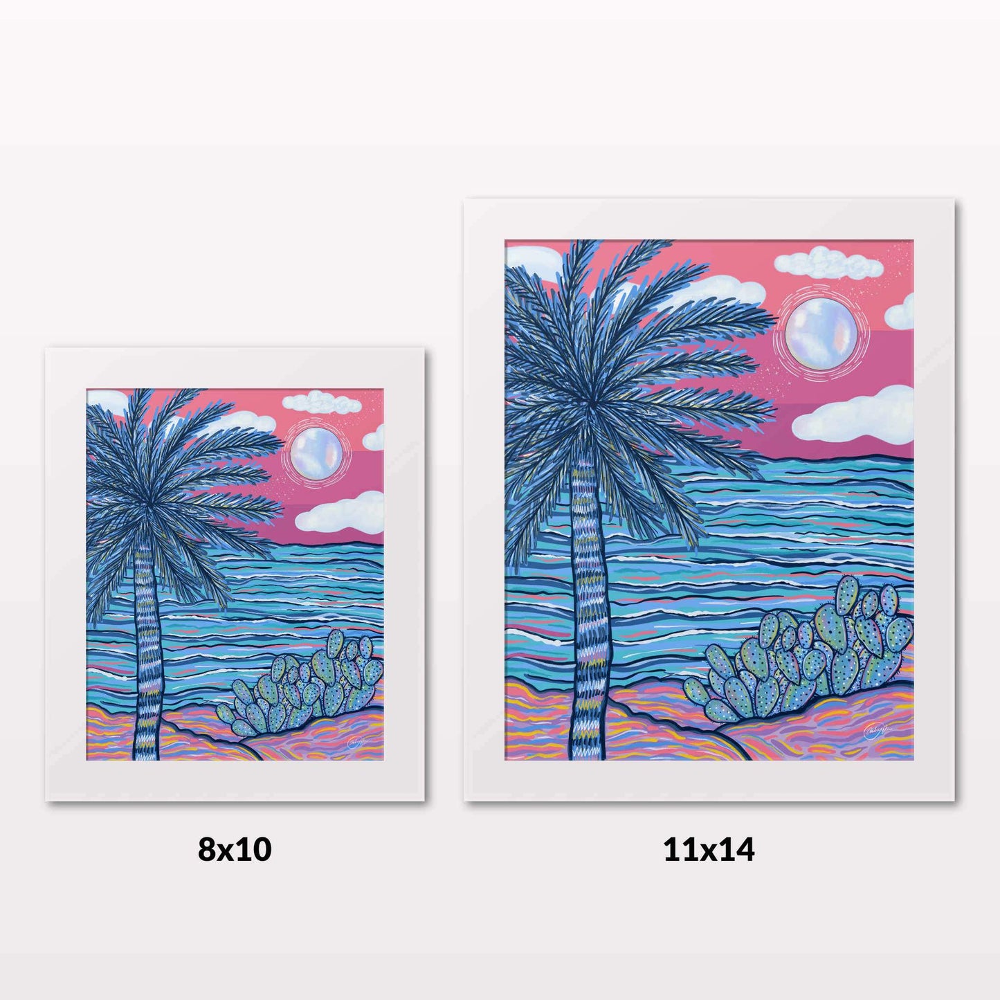 Comparing 8x10 and 11x14 framed art prints on a white wall