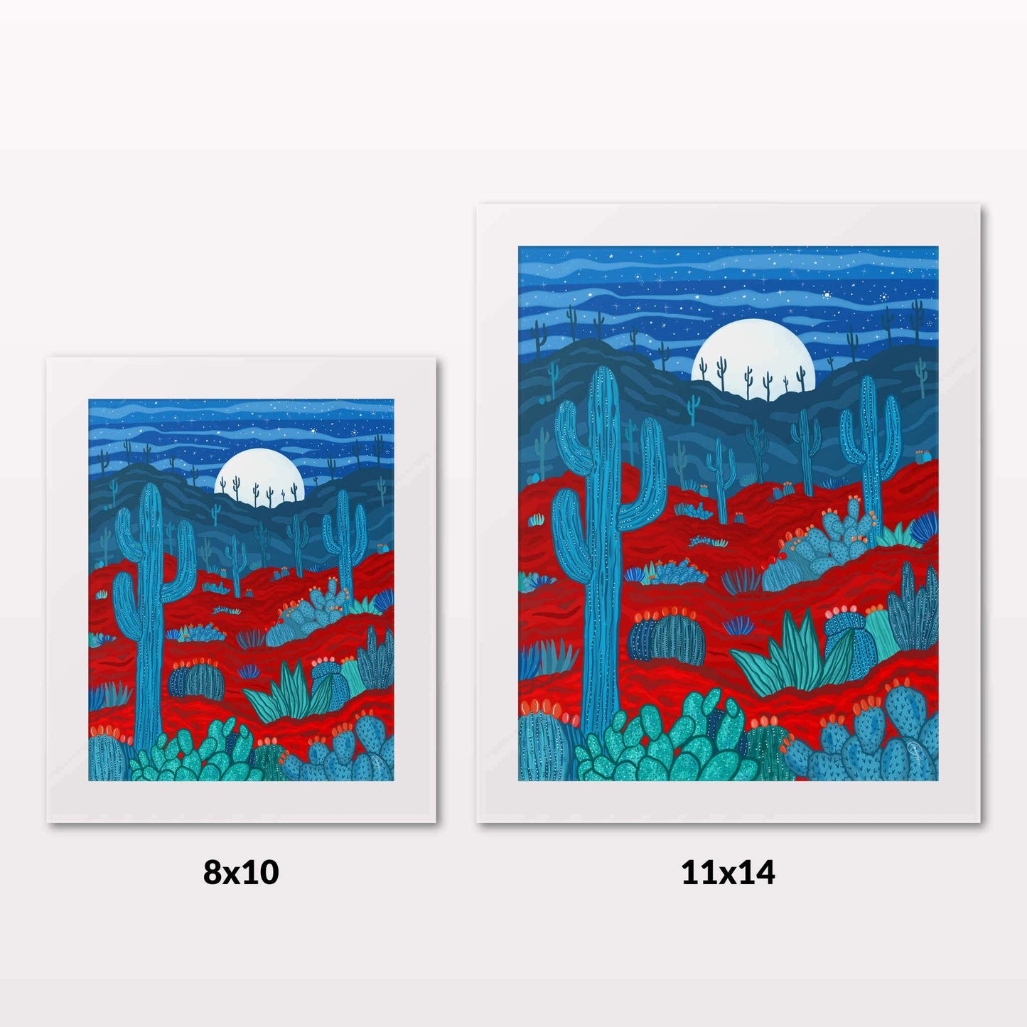 Comparing 8x10 and 11x14 framed art prints on a white wall