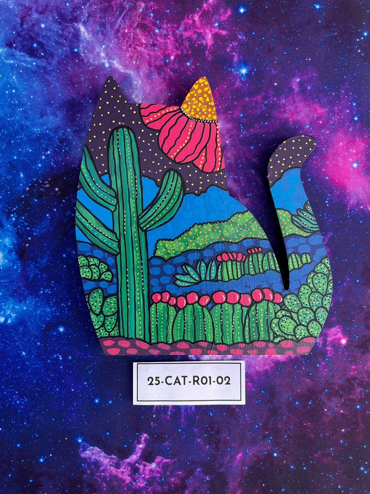 Hand Painted Item Sitting on Galaxy Background