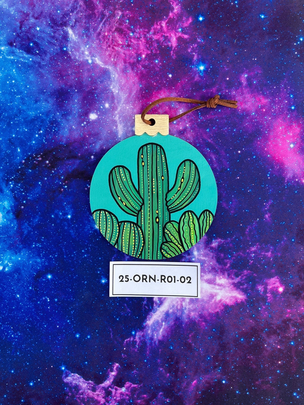 Hand Painted Item Sitting on Galaxy Background Front