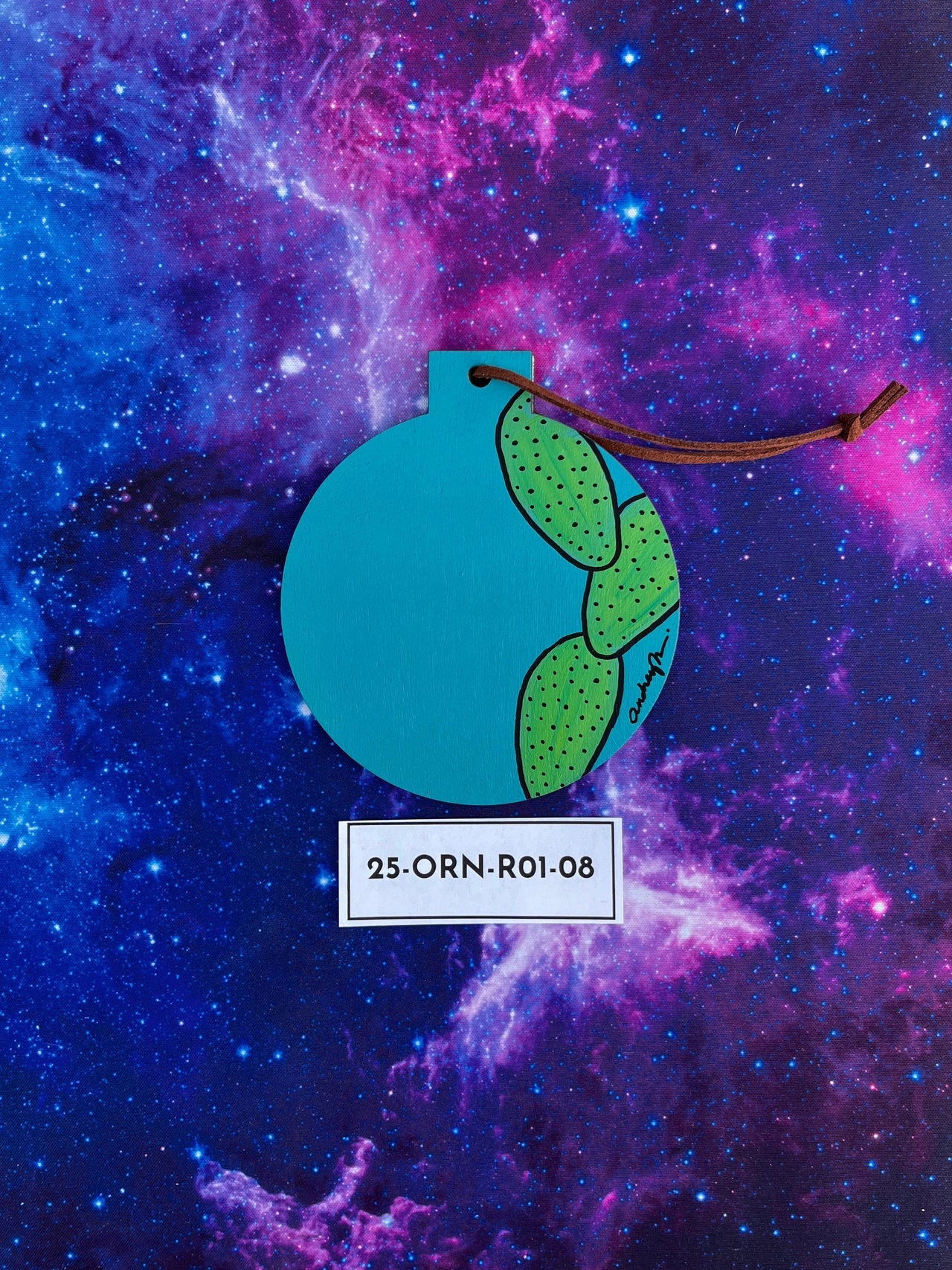 Hand Painted Item Sitting on Galaxy Background Back