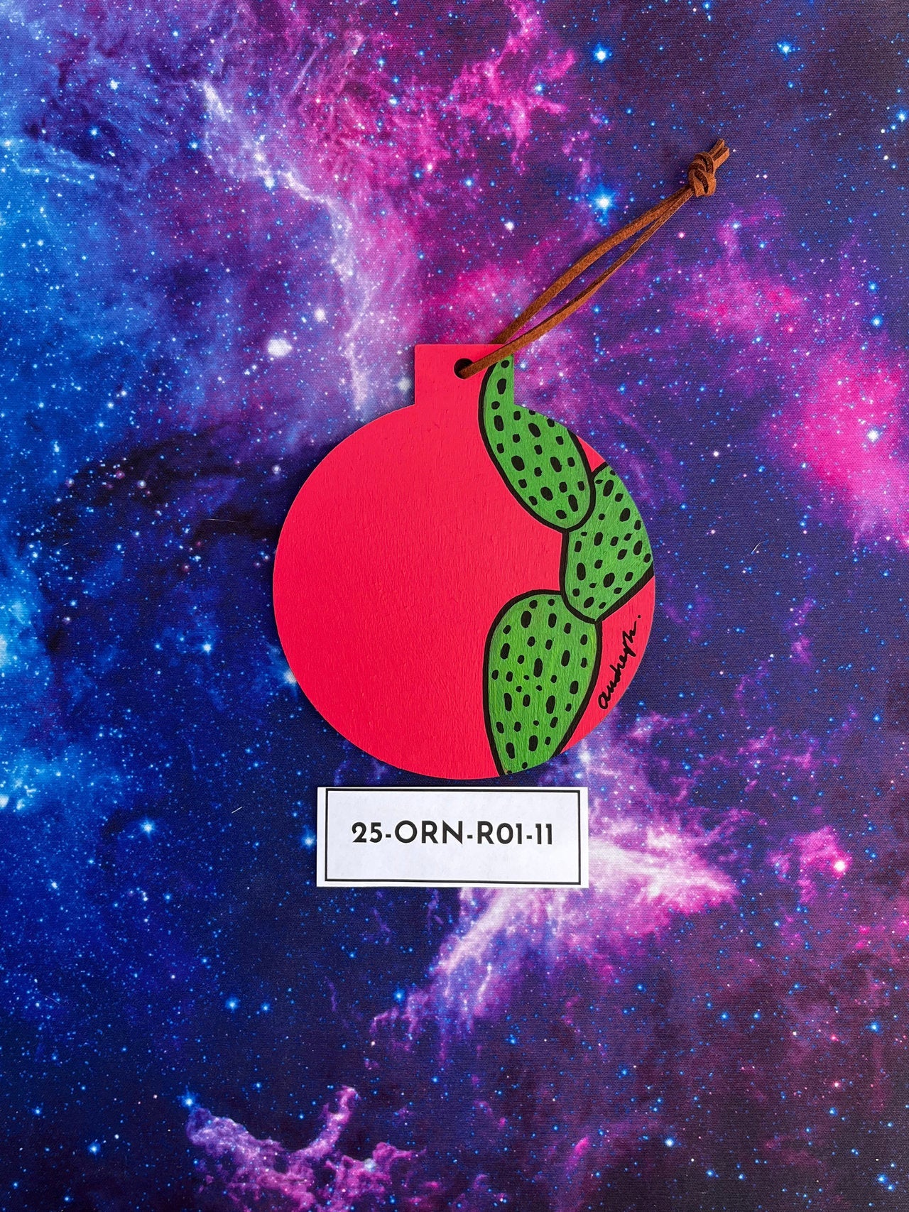 Hand Painted Item Sitting on Galaxy Background Back