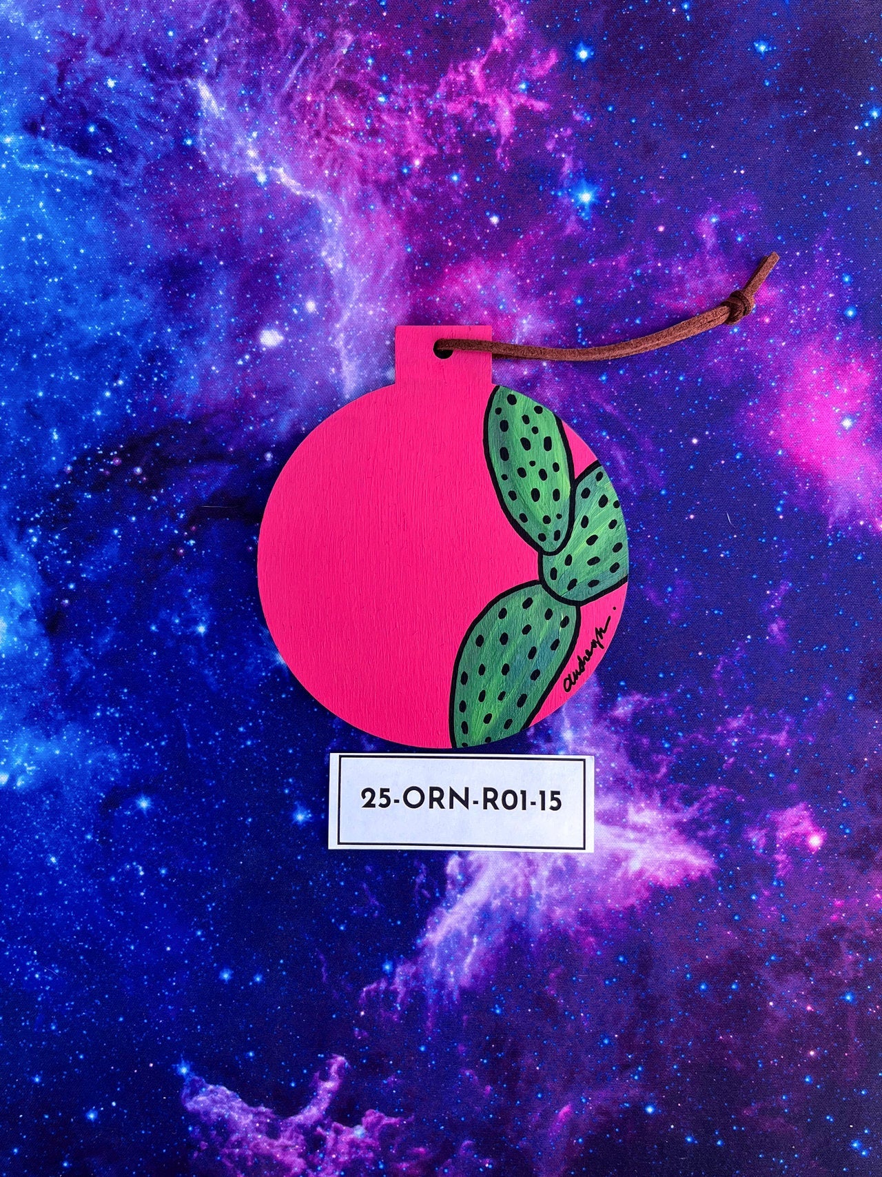 Hand Painted Item Sitting on Galaxy Background Back