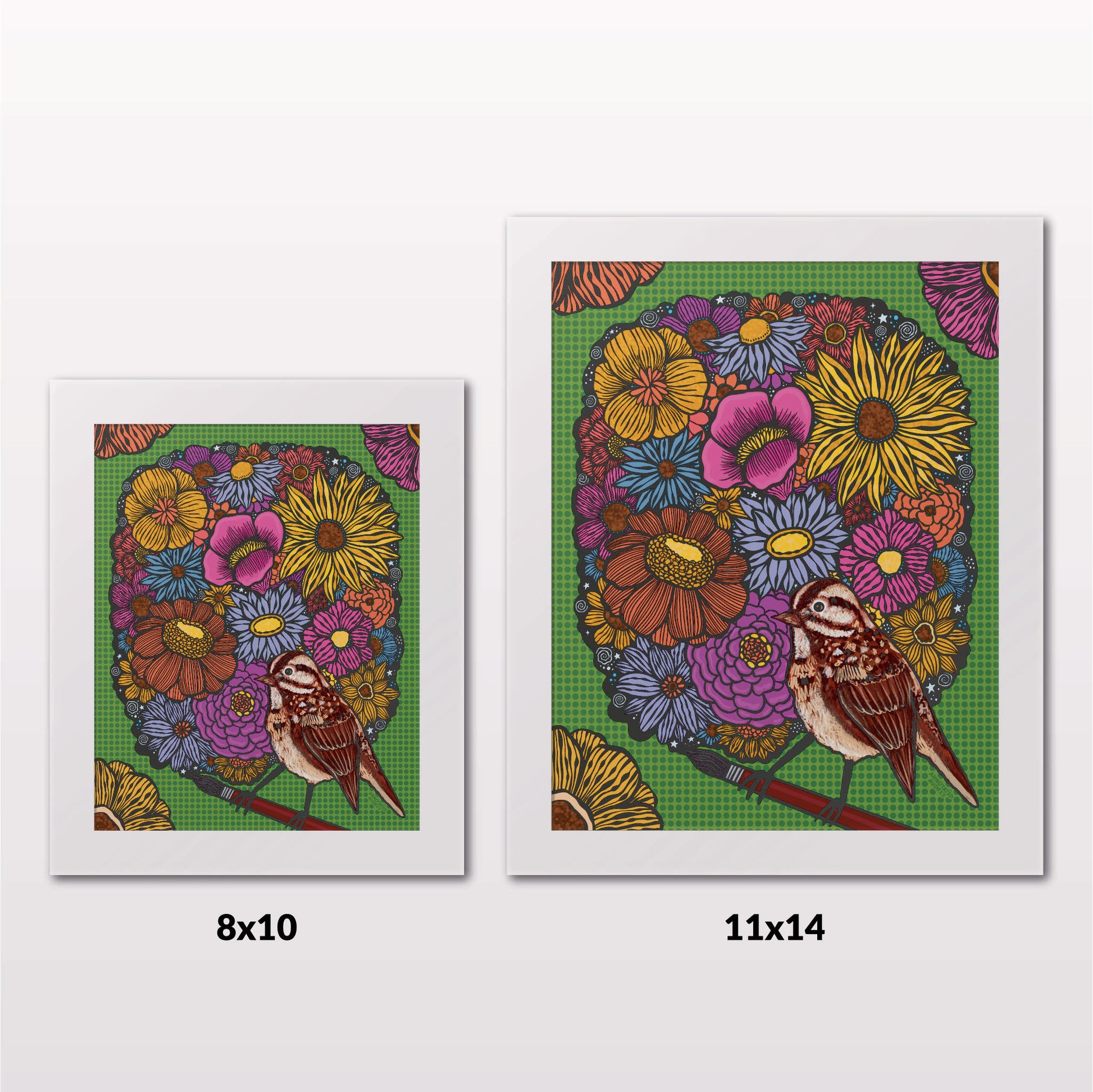 Comparing 8x10 and 11x14 framed art prints on a white wall