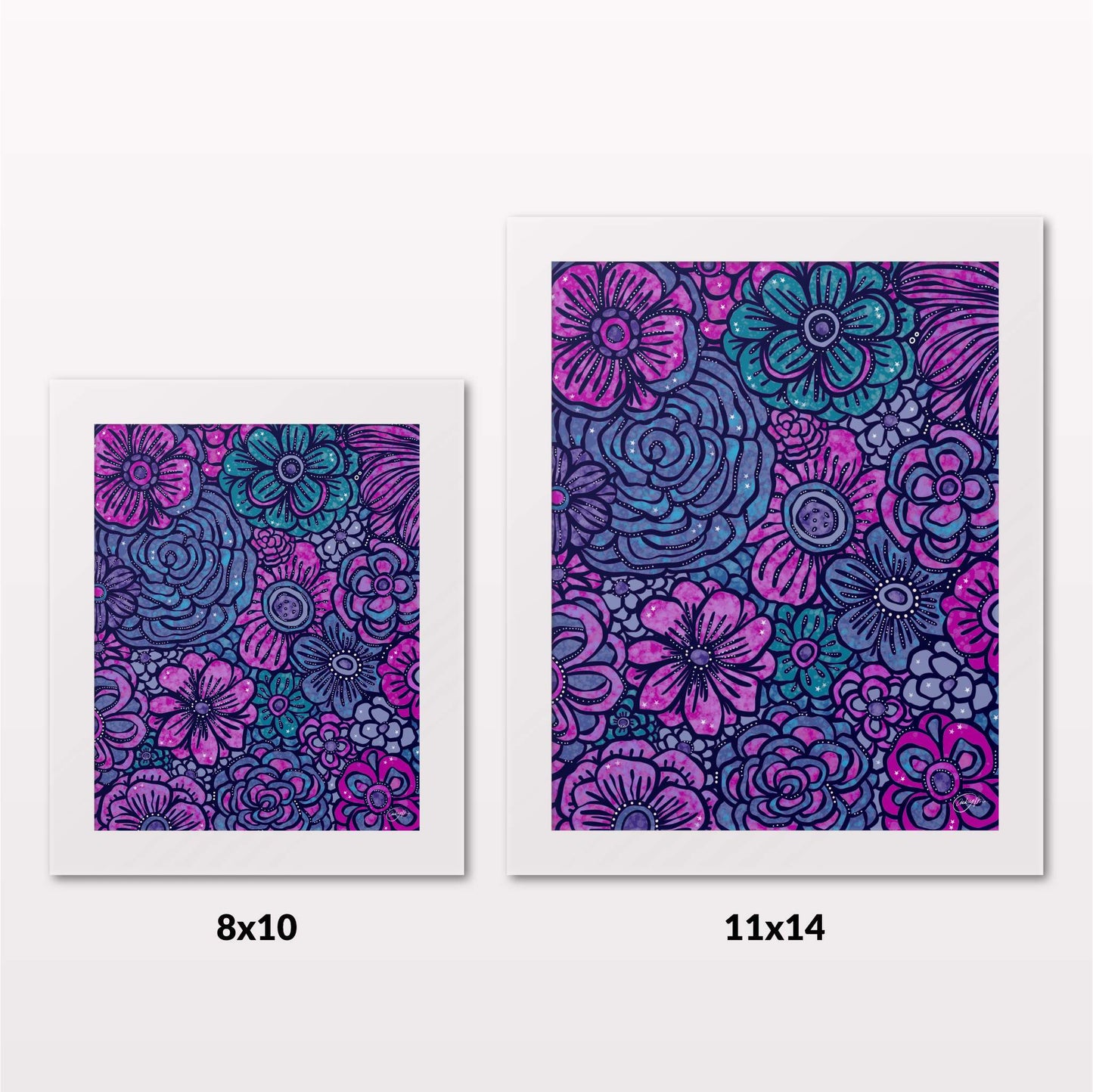 Comparing 8x10 and 11x14 framed art prints on a white wall