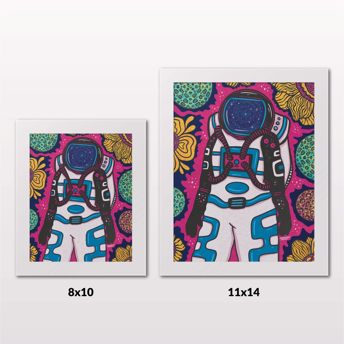 Comparing 8x10 and 11x14 framed art prints on a white wall