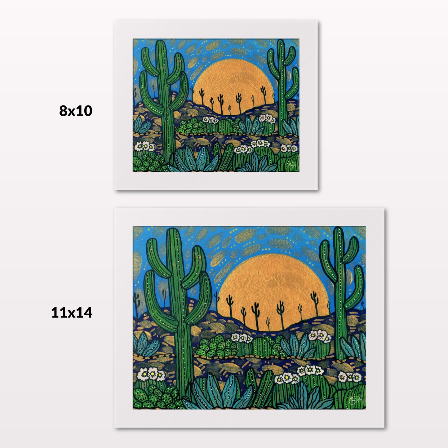 Comparing 8x10 and 11x14 framed art prints on a white wall