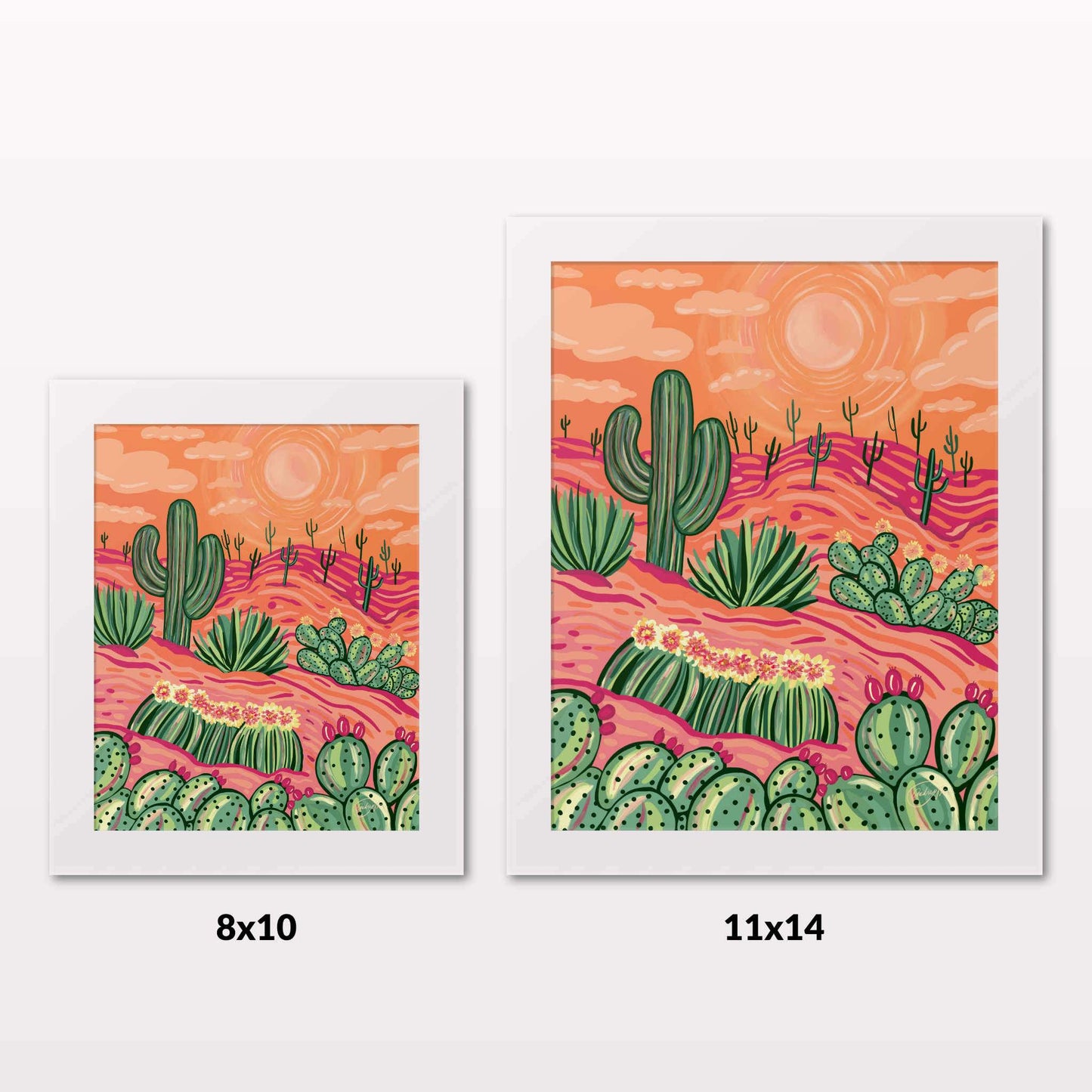 Comparing 8x10 and 11x14 framed art prints on a white wall