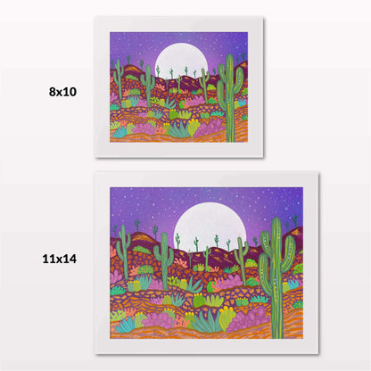 Comparing 8x10 and 11x14 framed art prints on a white wall