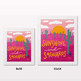 Comparing 8x10 and 11x14 framed art prints on a white wall