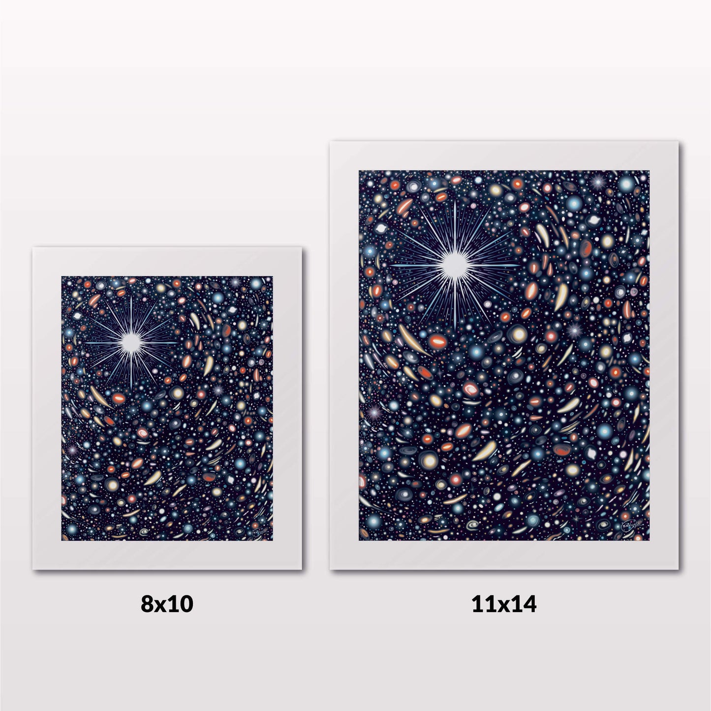 Comparing 8x10 and 11x14 framed art prints on a white wall