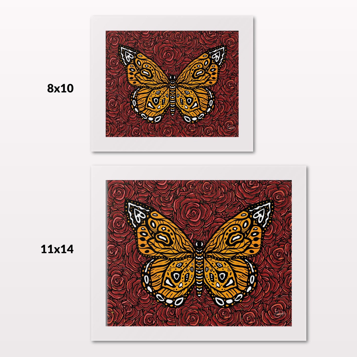 Comparing 8x10 and 11x14 framed art prints on a white wall