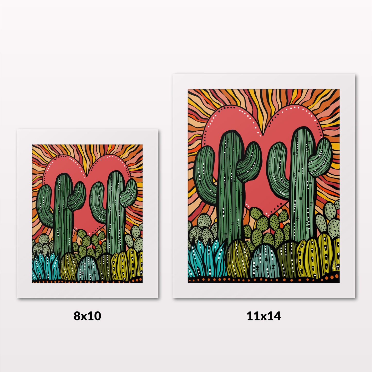 Comparing 8x10 and 11x14 framed art prints on a white wall
