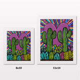 Comparing 8x10 and 11x14 framed art prints on a white wall
