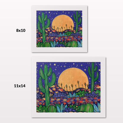 Comparing 8x10 and 11x14 framed art prints on a white wall
