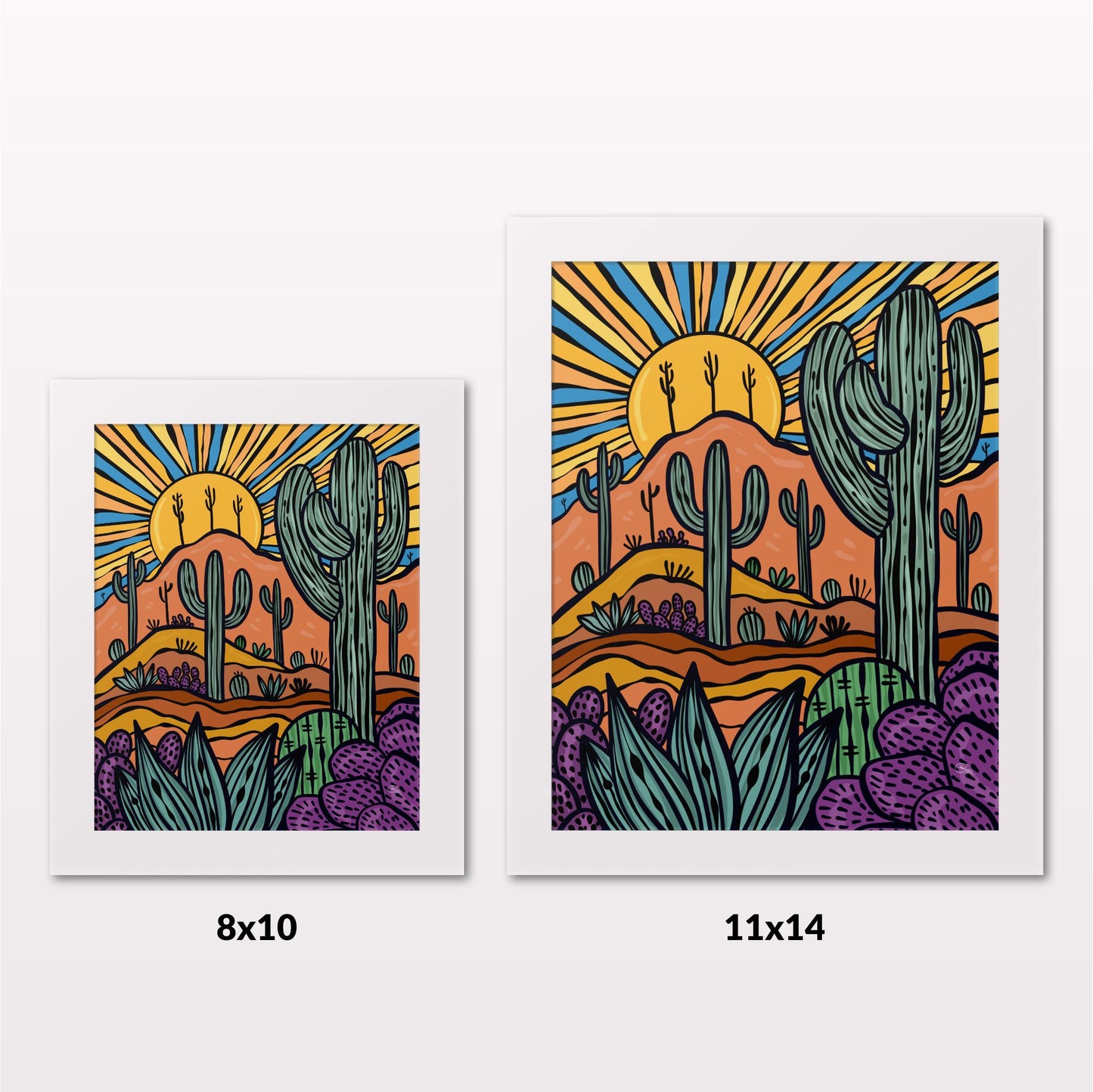 Comparing 8x10 and 11x14 framed art prints on a white wall