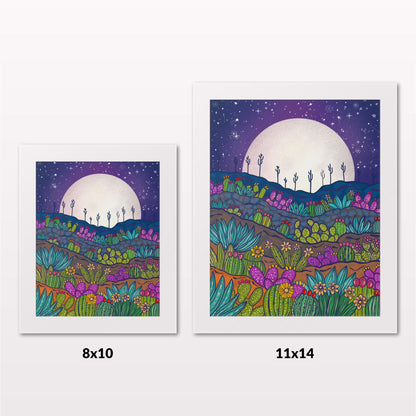 Comparing 8x10 and 11x14 framed art prints on a white wall