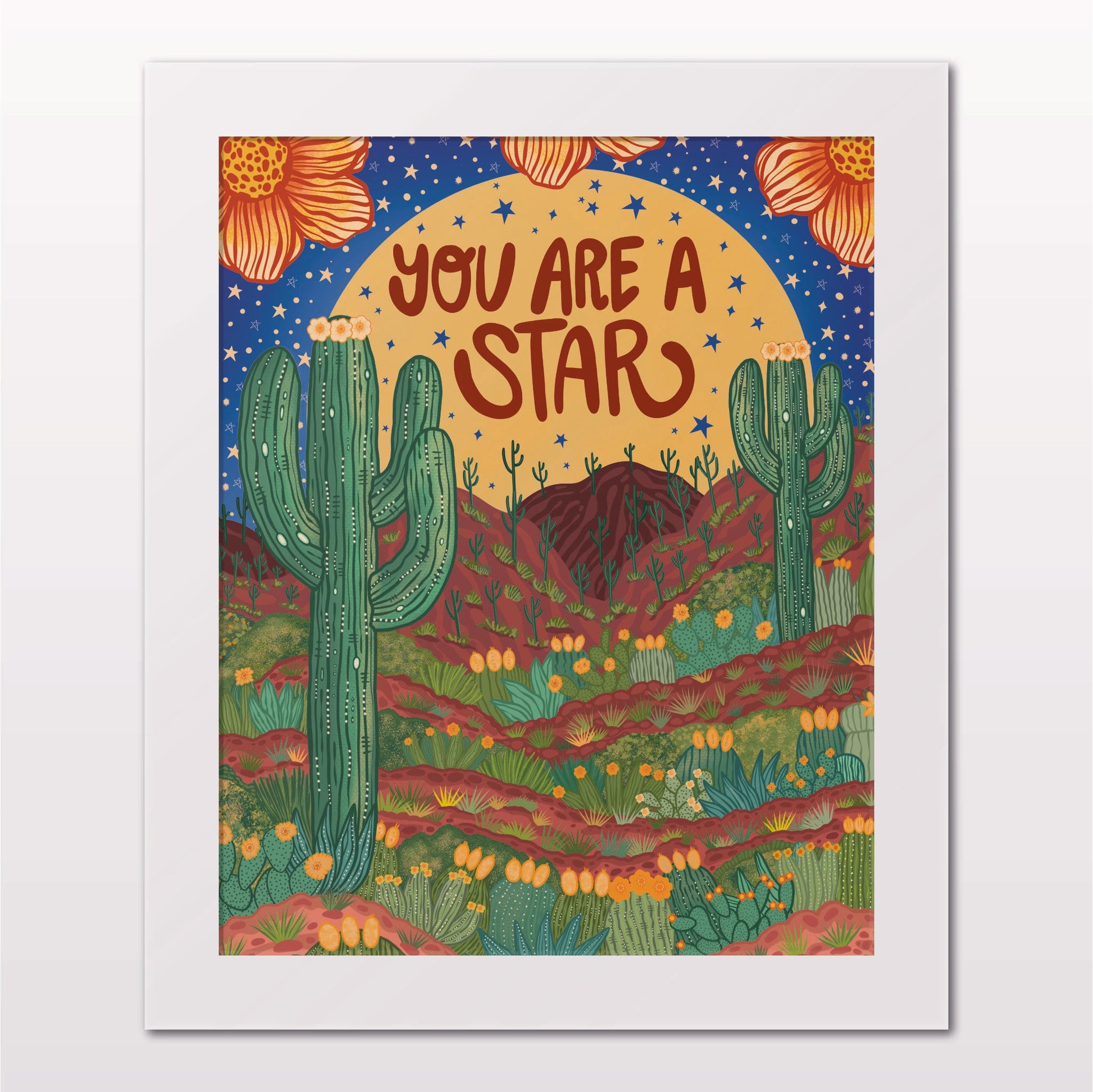 Art print in white frame on white wall