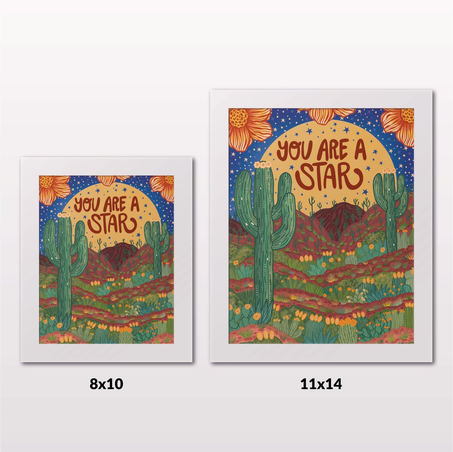 Comparing 8x10 and 11x14 framed art prints on a white wall