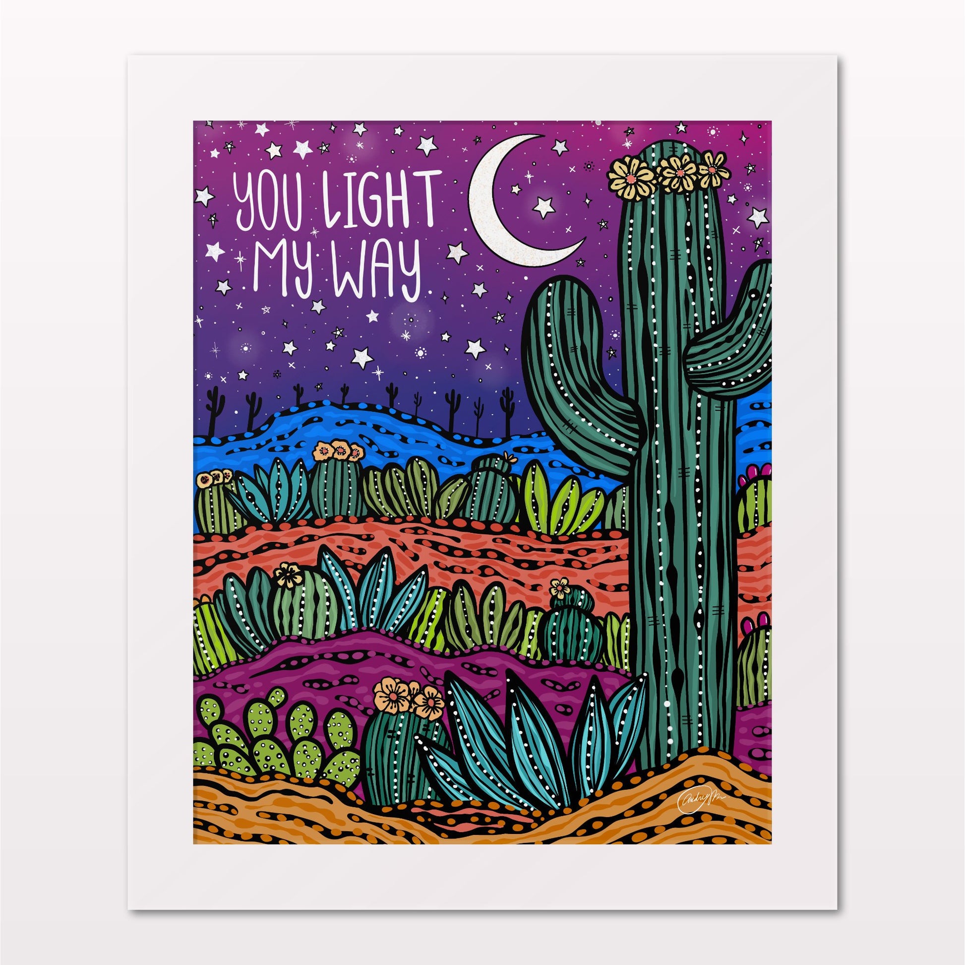Art print in white frame on white wall