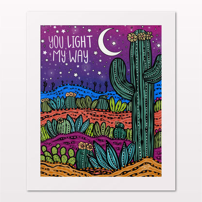 Art print in white frame on white wall