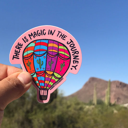 Holding Sticker In Nature